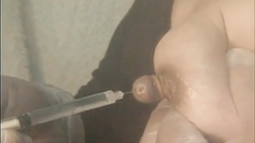 BDSM nipple play with needles from Japan