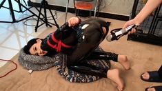 Chinese bondage with shiny black outfit and vibrator