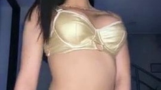 Busty curly brunette with big boobs fucks on couch