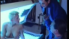 Blonde In A Tanning Booth Gets A Stick To Eat And Gets Fucked Inside